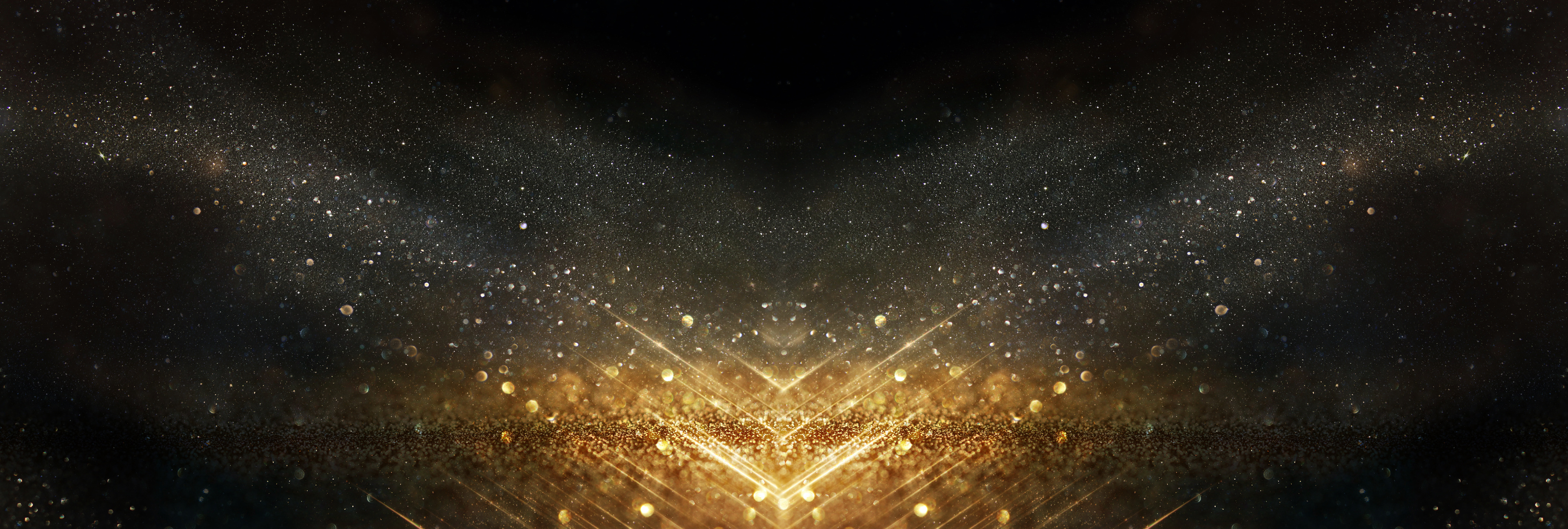 glitter vintage lights background. black and gold. de-focused